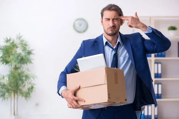 Young man being fired from his work — Stock Photo, Image