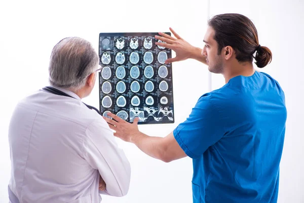 Two male doctors working in the clinic — Stock Photo, Image