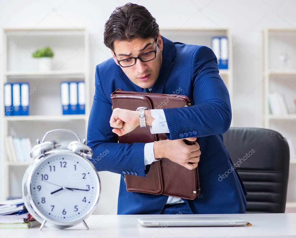Businessman in bad time management concept