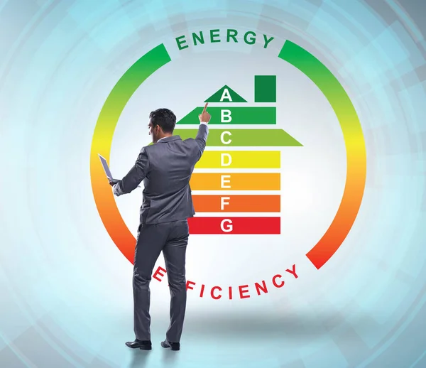 Zakenman in het concept energie-efficiëntie — Stockfoto