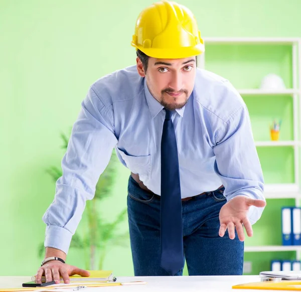 Young male architect working at the project — Stock Photo, Image