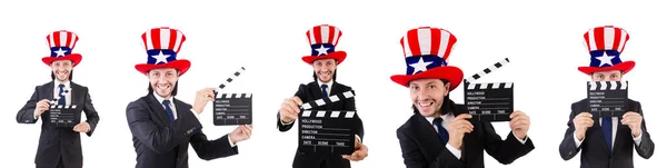 Homem com chapéu EUA e placa de filme isolado em branco — Fotografia de Stock