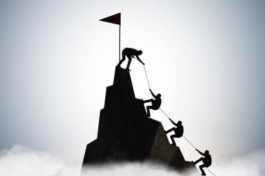Takım çalışması kavramı dağın zirvesine tırmanıyor.