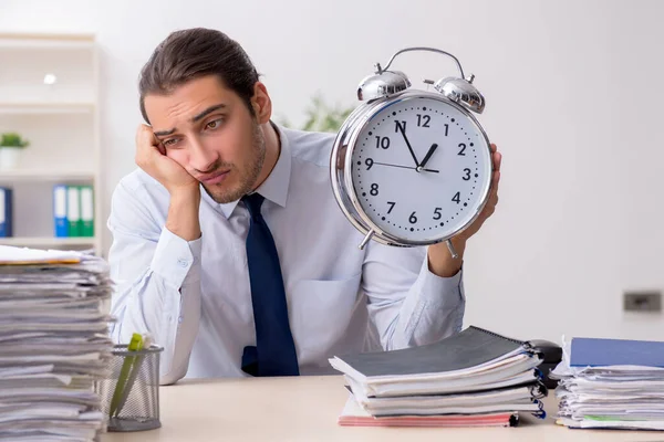 Young male businessman employee unhappy with excessive work — Stock Photo, Image