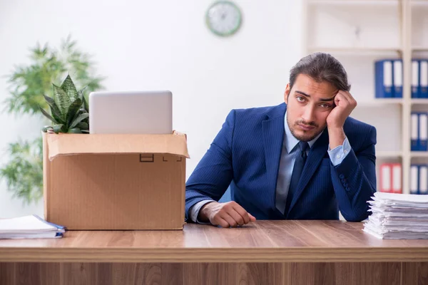 Young man being fired from his work — Stock Photo, Image