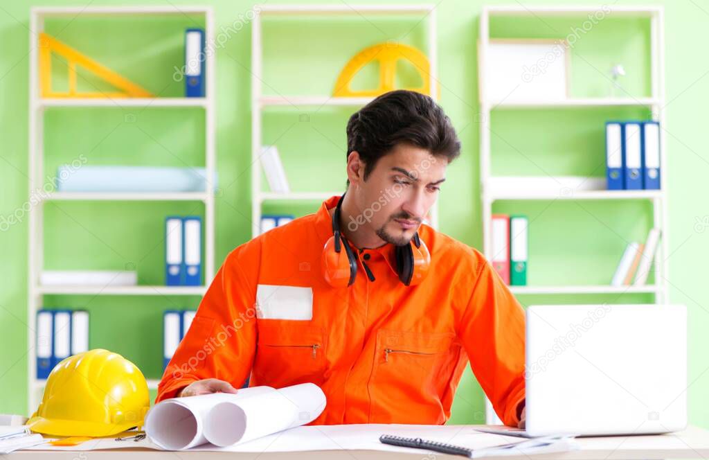 Construction supervisor planning new project in office