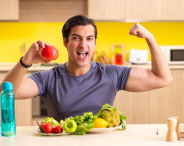 Junger Mann im Diät- und Ernährungskonzept — Stockfoto