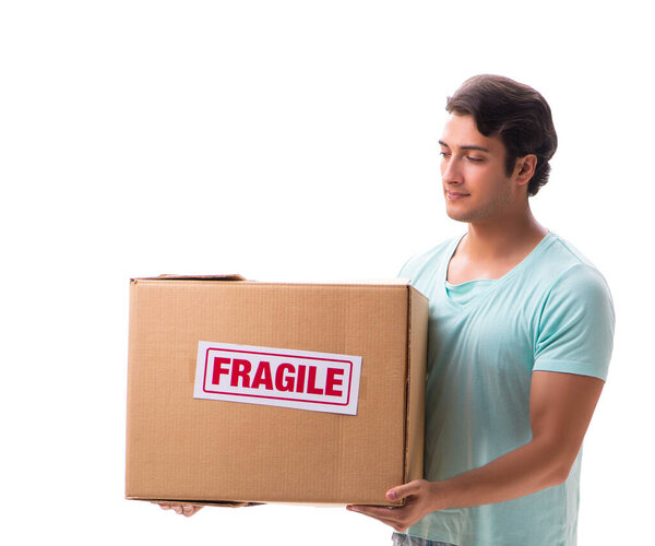 Young handsome man with fragile box ordered from Internet