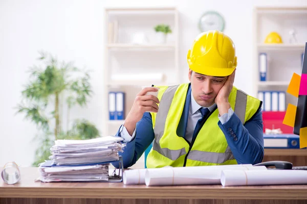 Young male architect working in the office — Stock Photo, Image