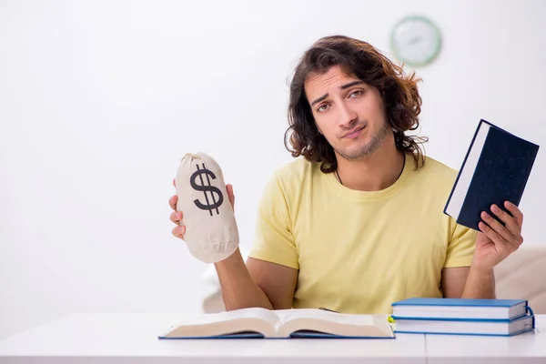 Young male student preparing for exams at home — Stock Photo, Image