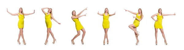 Hübsche große Frau im kurzen gelben Kleid auf weißem Grund — Stockfoto