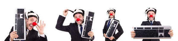 Legrační klaun s klávesnicí izolovaných na bílém — Stock fotografie