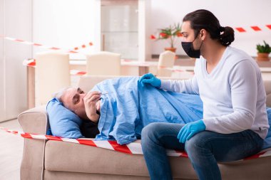 Baba ve oğul Coronavirus hastalığı konseptinde.
