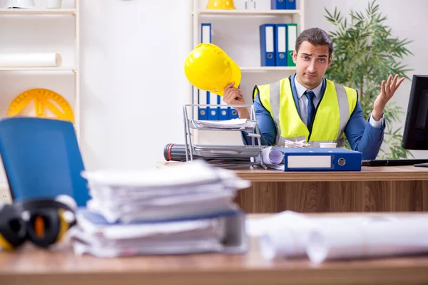 Young male architect working in the office — Stock Photo, Image