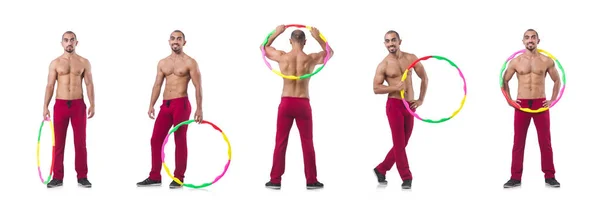 Man doing excecises with hula hoop — Stock Photo, Image