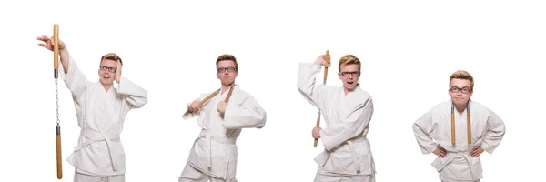 Combattente karate divertente con nunchaku su bianco — Foto Stock