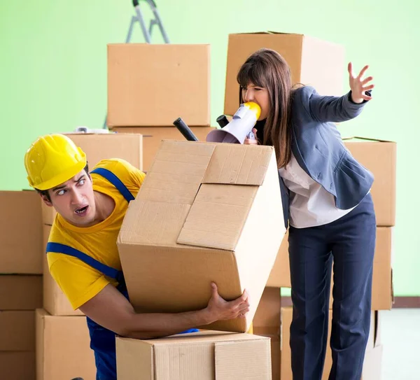 Woman boss and man contractor working with boxes delivery — Stock Photo, Image