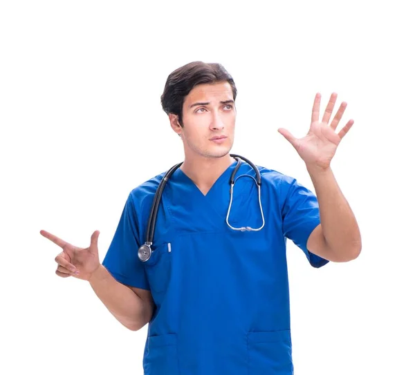 Joven médico masculino presionando botones aislados en blanco — Foto de Stock