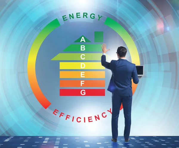 Zakenman in het concept energie-efficiëntie — Stockfoto