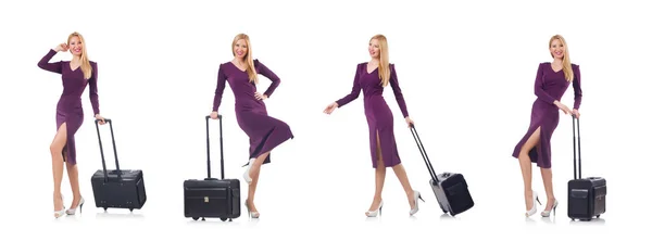 Vrouw bereidt zich voor op vakantie met koffer op wit — Stockfoto