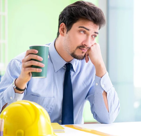 Young male architect working at the project — Stock Photo, Image