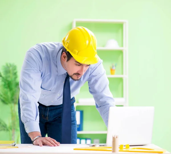 Young male architect working at the project — Stock Photo, Image