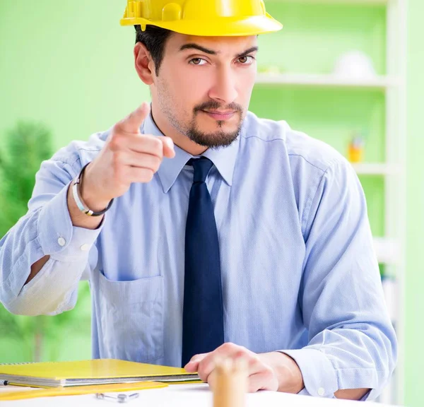 Young male architect working at the project — Stock Photo, Image