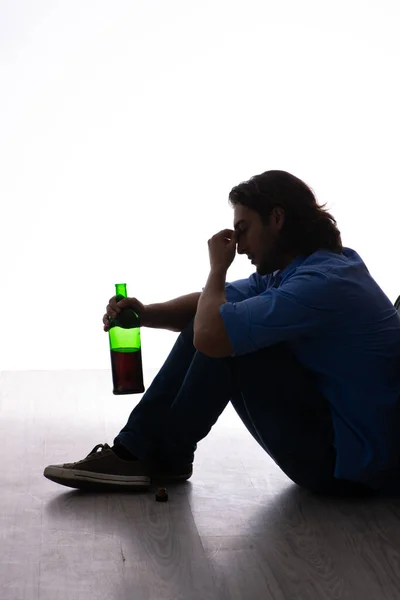 Young man suffering from alcoholism — Stock Photo, Image