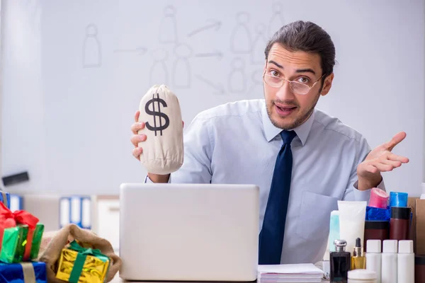 Young male shopaholic in e-commerce concept — Stock Photo, Image