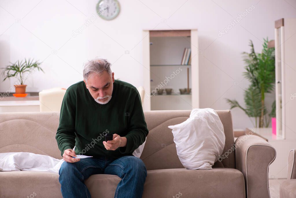 Old man suffering at home