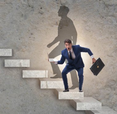 İş adamı ve iş konseptindeki gölgesi