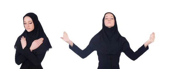 Młoda muzułmanka modląca się na białym — Zdjęcie stockowe