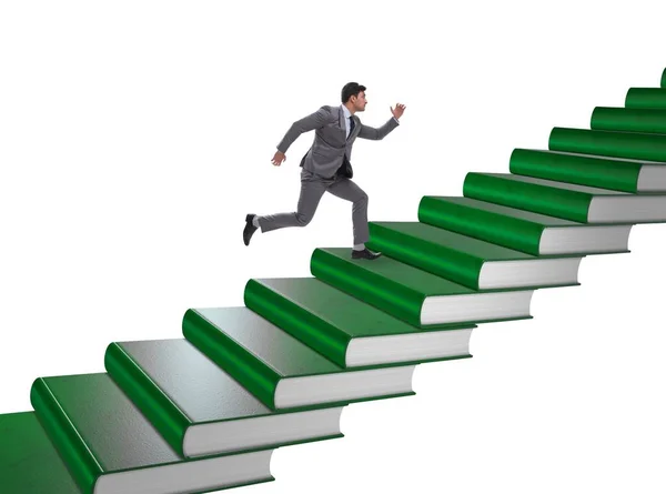 Estudiante de negocios escalando la escalera de los libros de educación — Foto de Stock