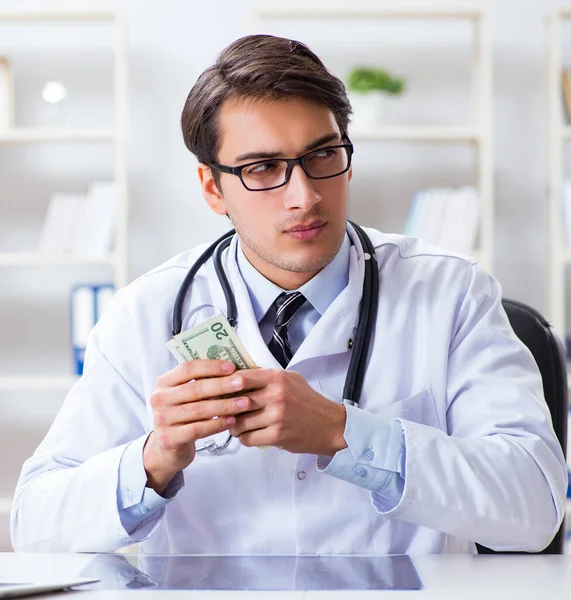 Doctor in corruption concept with being offered bribe — Stock Photo, Image