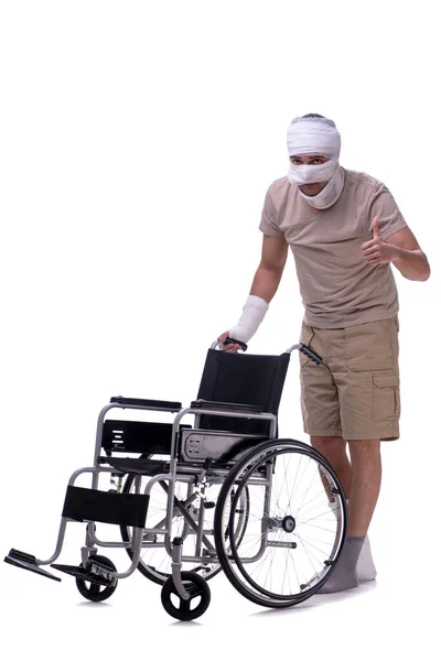 Injured man in wheel-chair isolated on white — Stock Photo, Image