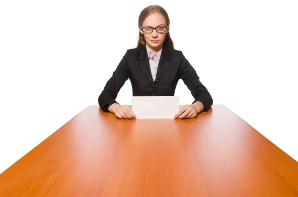 Empregada feminina sentada em mesa longa isolada em branco — Fotografia de Stock