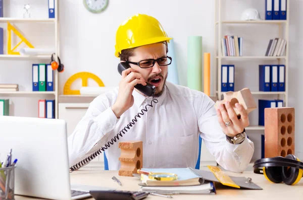 Young male architect working in the office — Stock Photo, Image