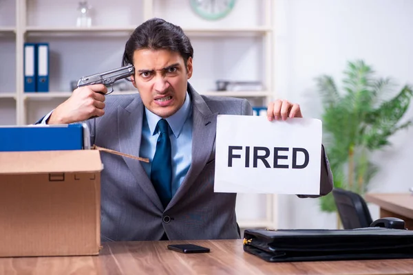 Young male employee being fired from his work — Stock Photo, Image