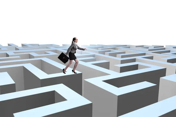 Businesswoman trying to escape from maze — Stock Photo, Image