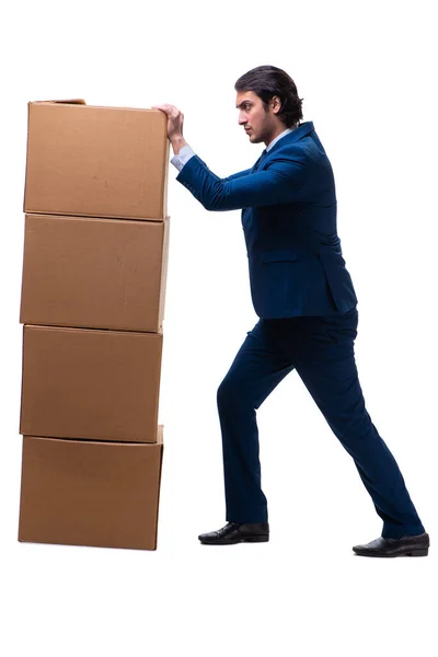 Young male employee with boxes isolated on white — Stock Photo, Image