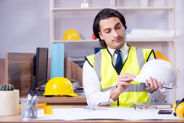 Young male architect working in the office — Stock Photo, Image