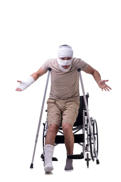 Injured man in wheel-chair isolated on white — Stock Photo, Image