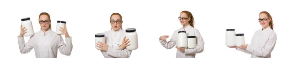 Young female doctor holding jar of protein isolated on white — Stock Photo, Image