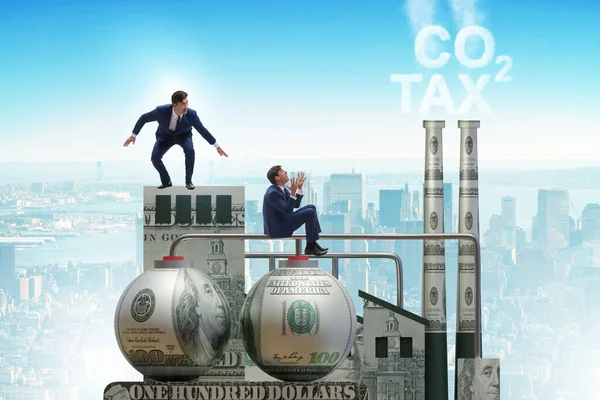 Businessman in carbon tax concept — Stock Photo, Image