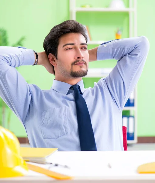 Young male architect working at the project — Stock Photo, Image