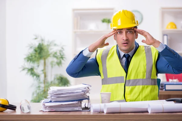 Young male architect working in the office — Stock Photo, Image