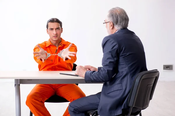 Young captive meeting with advocate in pre-trial detention