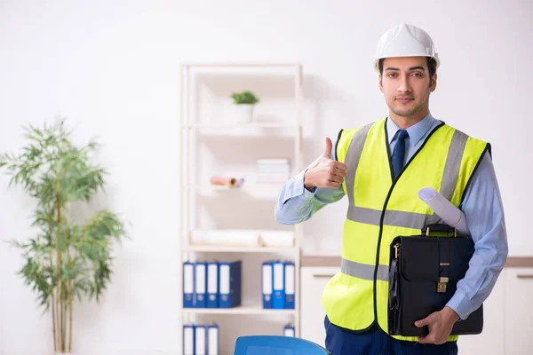 Young male architect working in the office — Stock Photo, Image