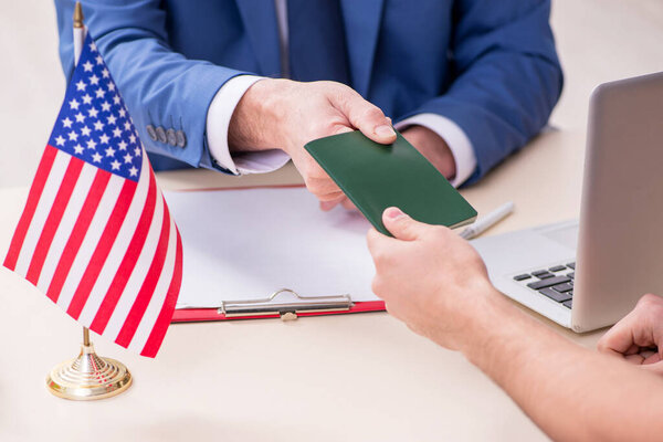 Young man visiting embassy for visa application