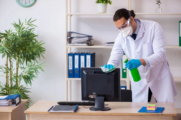 Young male doctor virologist in the office — Stock Photo, Image